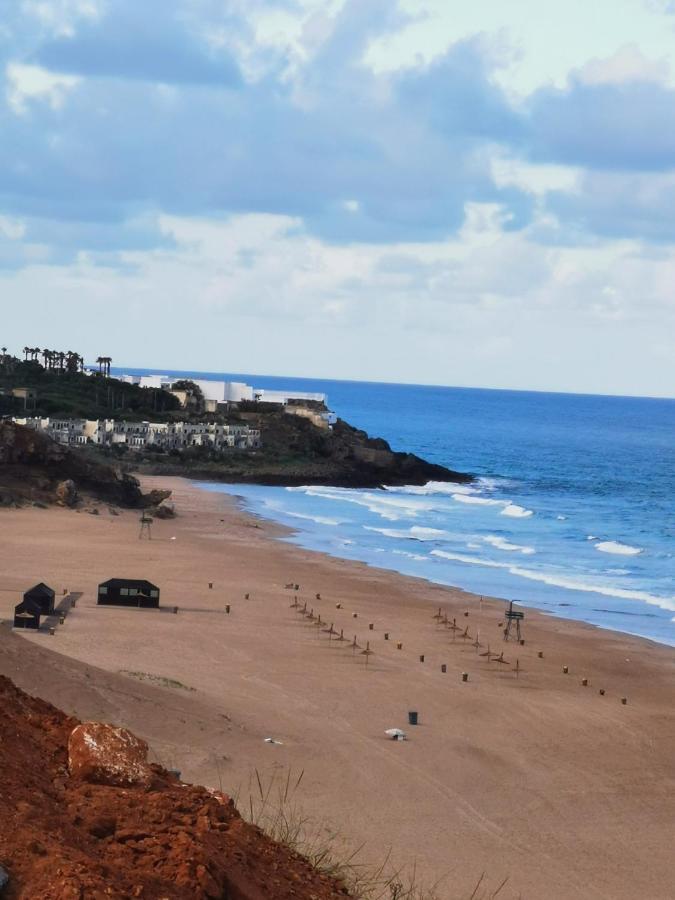 Appartement Avec Piscines, Vue Sur Mer Et Acces A La Plage A Achakar Hill, Tanger. Extérieur photo