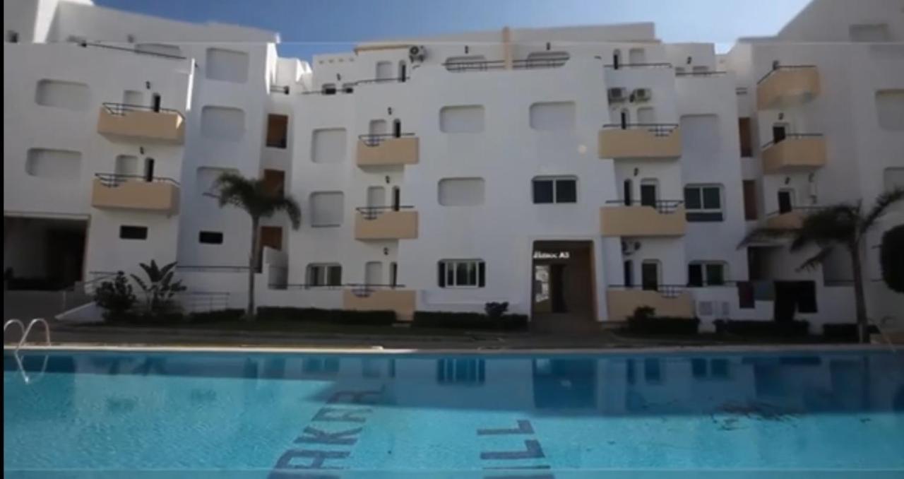 Appartement Avec Piscines, Vue Sur Mer Et Acces A La Plage A Achakar Hill, Tanger. Extérieur photo