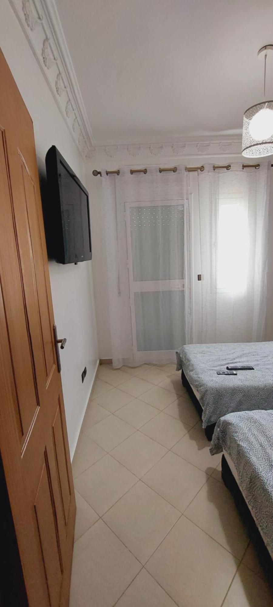Appartement Avec Piscines, Vue Sur Mer Et Acces A La Plage A Achakar Hill, Tanger. Extérieur photo