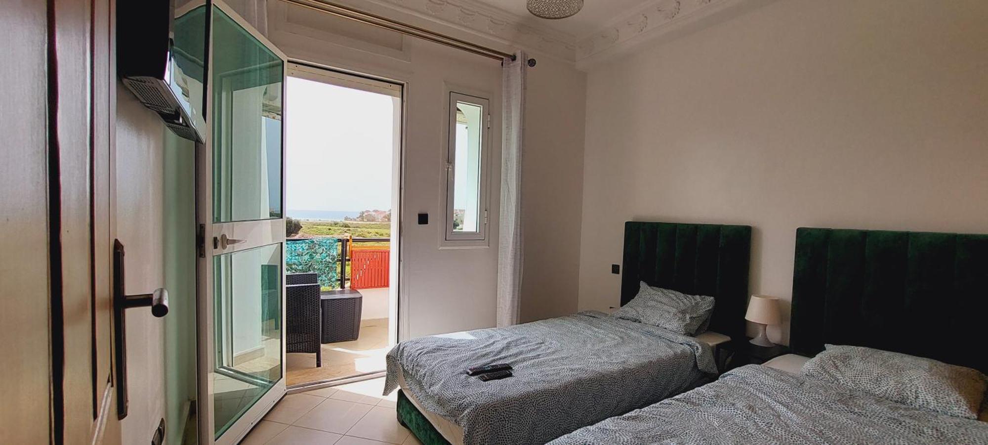 Appartement Avec Piscines, Vue Sur Mer Et Acces A La Plage A Achakar Hill, Tanger. Extérieur photo