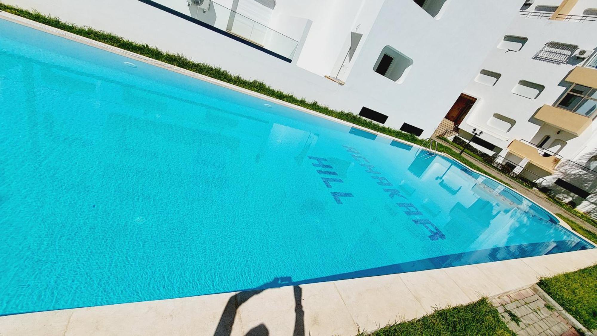 Appartement Avec Piscines, Vue Sur Mer Et Acces A La Plage A Achakar Hill, Tanger. Extérieur photo